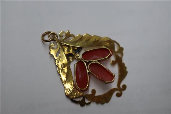 A 14k yellow metal and coral set drop pendant, 44mm.